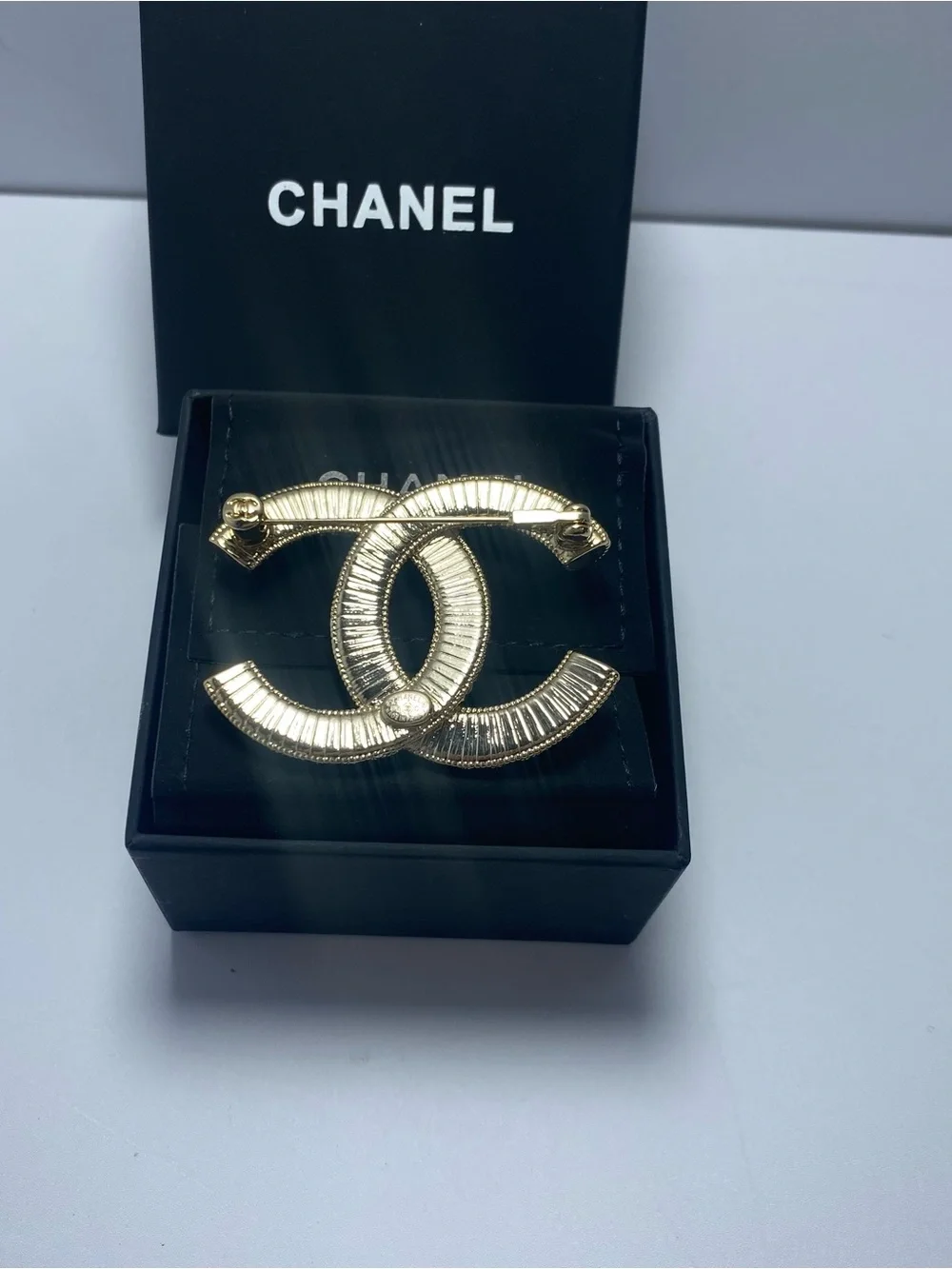 CHANEL Gold Crystal Interlocking CC Brooch